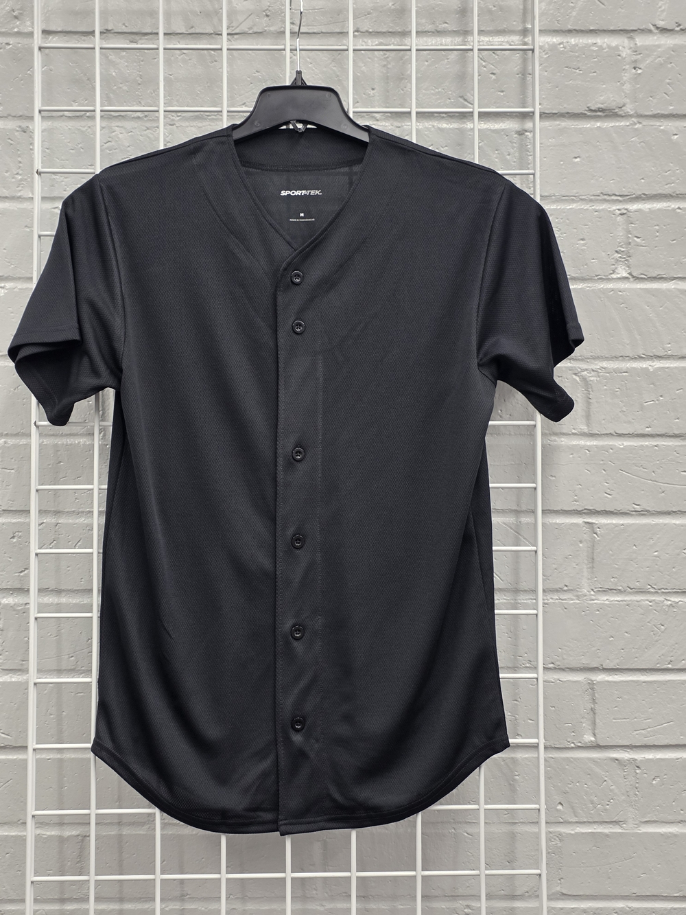 Sport-Tek Men's Black Button-Front Short Sleeve Baseball Shirt.